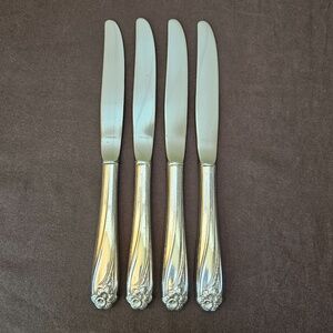 1847 ROGERS BROS.  SILVERPLATED DAFFODIL KNIVES.  SET OF 4